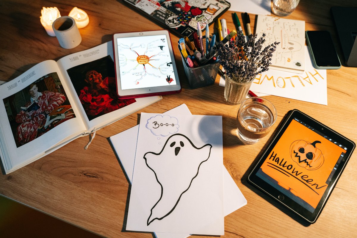 https://www.pexels.com/photo/halloween-drawings-on-a-table-5428707/