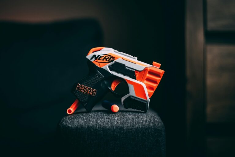 https://www.pexels.com/photo/toy-gun-in-shadow-20876302/