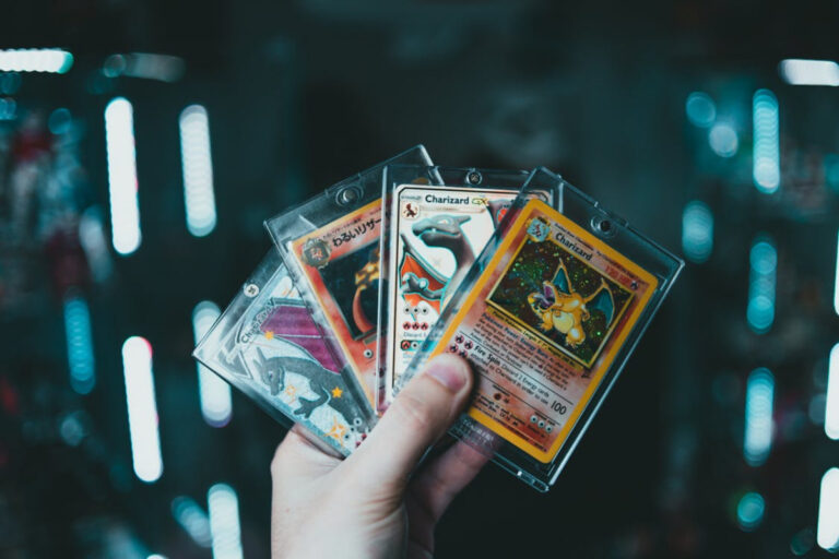 https://www.pexels.com/photo/a-person-holding-pokemon-trading-cards-9661252/